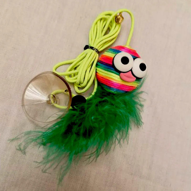 اسباب بازی آویز چسبان رنگین کمانی - رنگ سبز پر رنگ